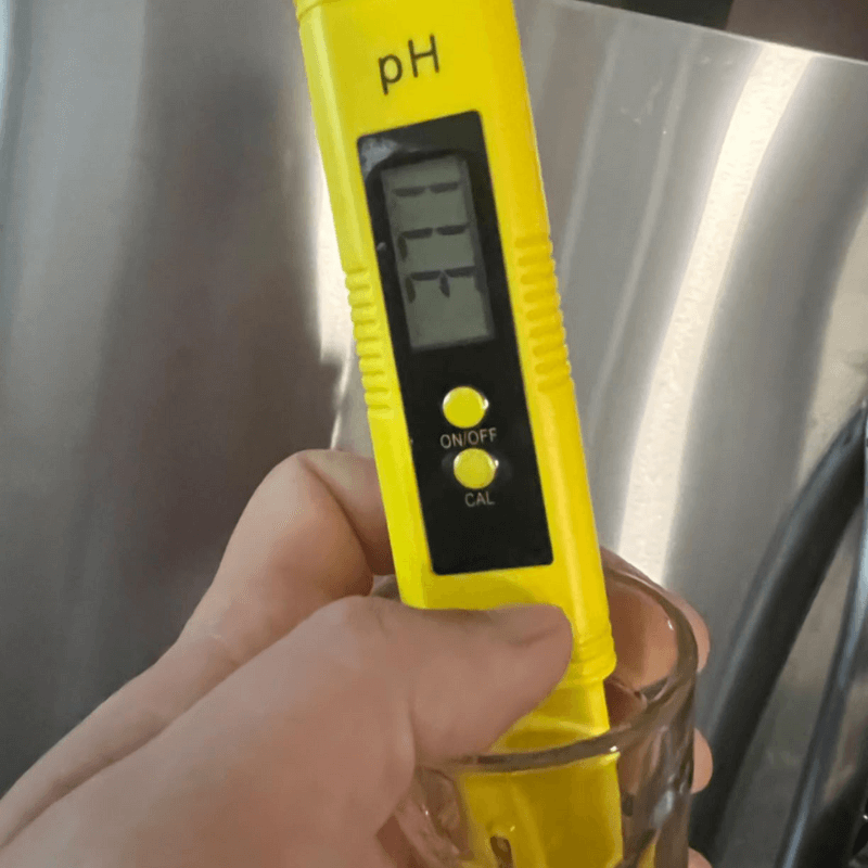 PH meter in use testing water