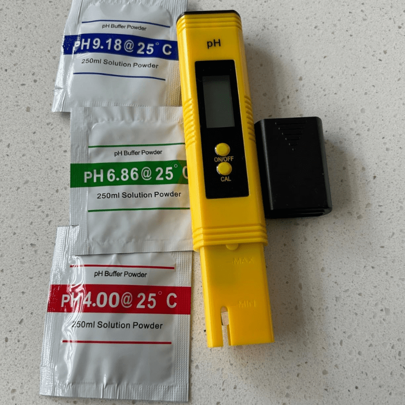 PH meter on manual sheet flat lay
