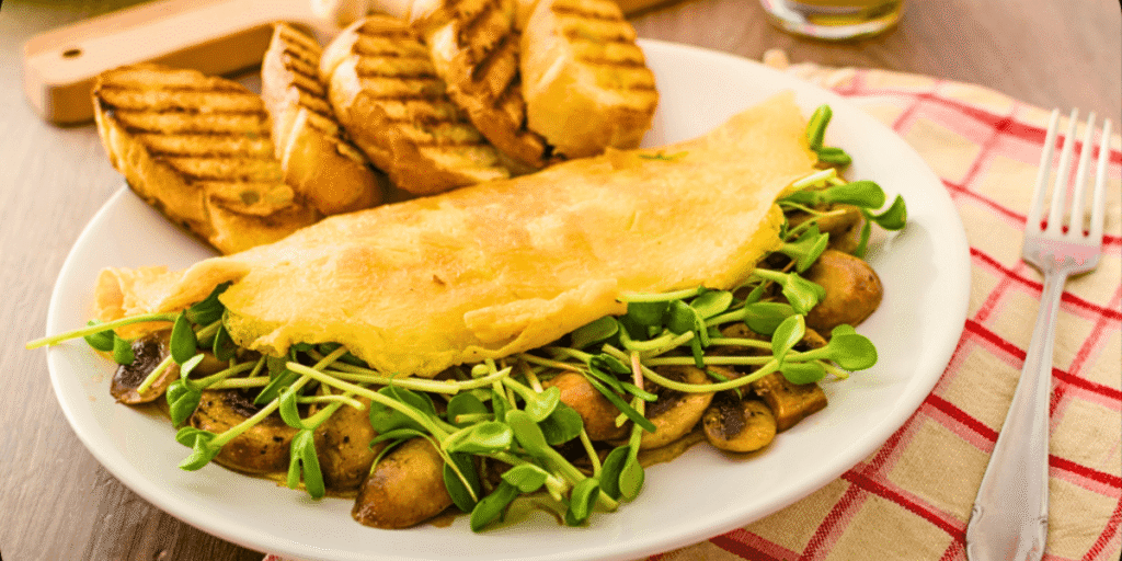 A beautifully plated dish featuring a colorful mix of fresh microgreens as part of a healthy meal.