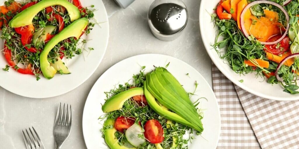 fresh salad with microgreens healthy bowl.